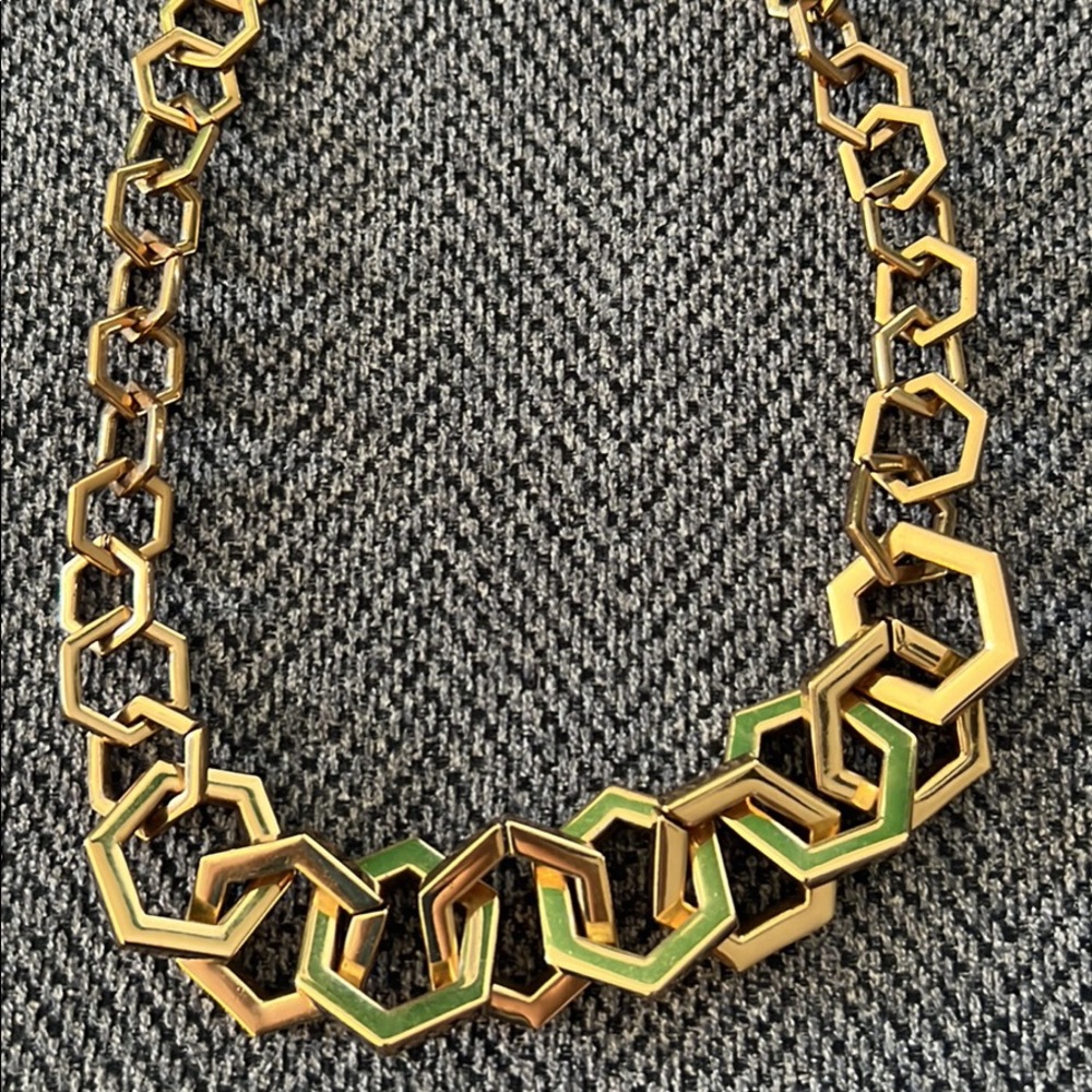 Tory Burch gold necklace.